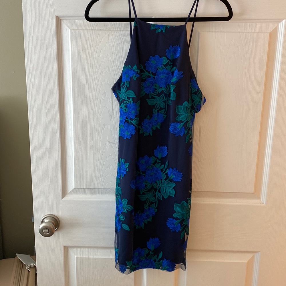 Navy dress with blue and green floral aplique detailing
